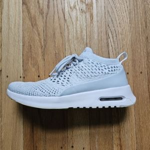 Nike gray and white sneakers